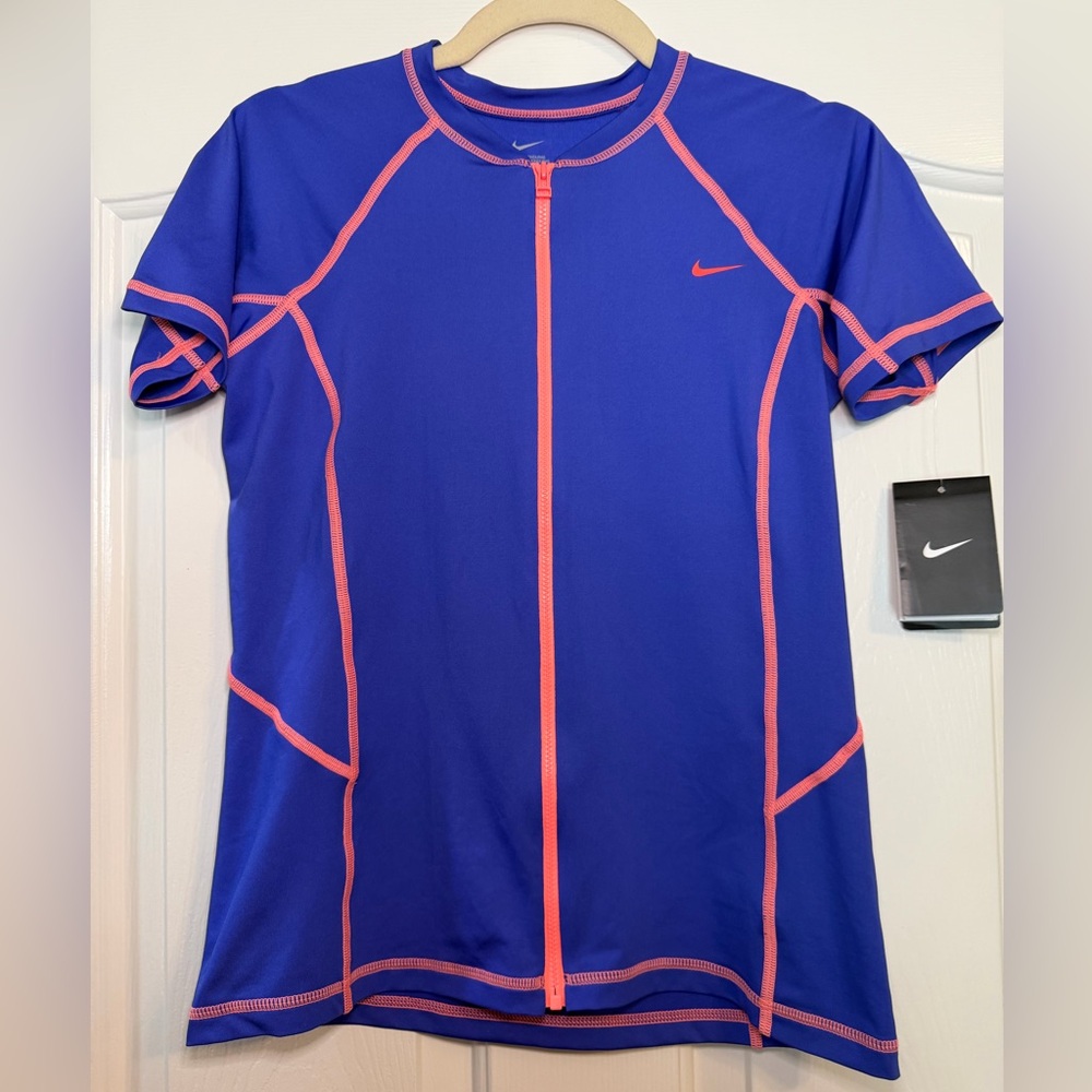 ‼️DONATING 10/17‼️ 
NWT Nike Blue Swim Shirt with UV protection.